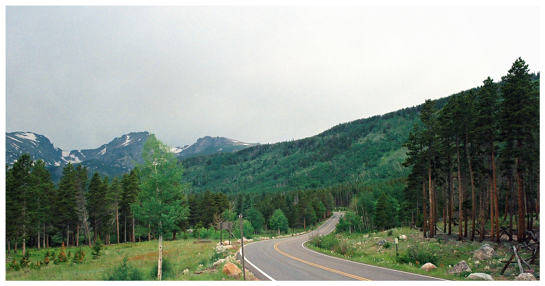 A road curving through a mountain landscape